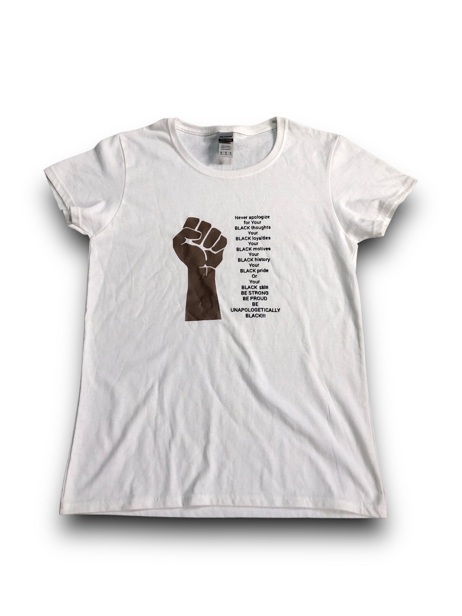 White t-shirt with a black fist graphic and text on a white background